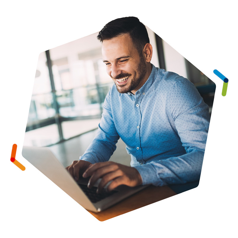 Smiling man using laptop for a video call