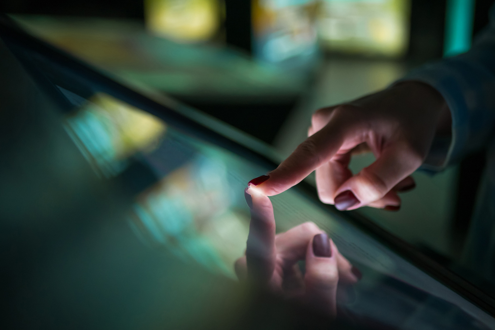 Woman using interactive touchscreen display