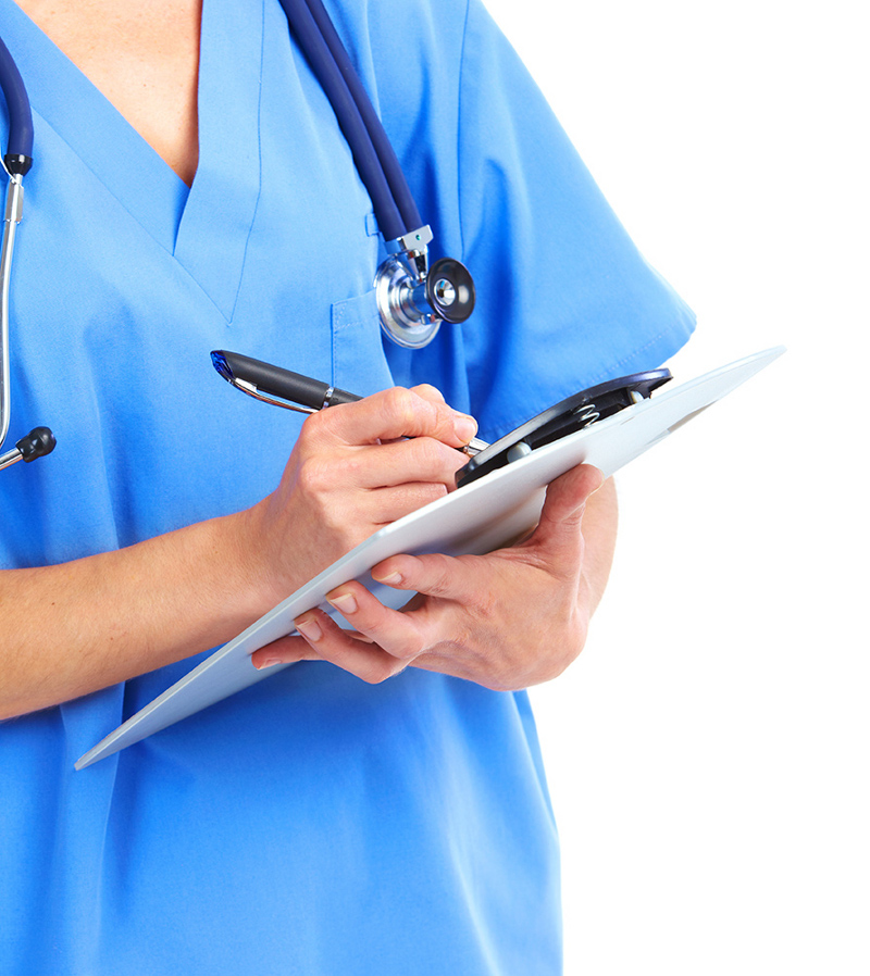 Close Up of Medical Professional in Scrubs Holding a Clipboard