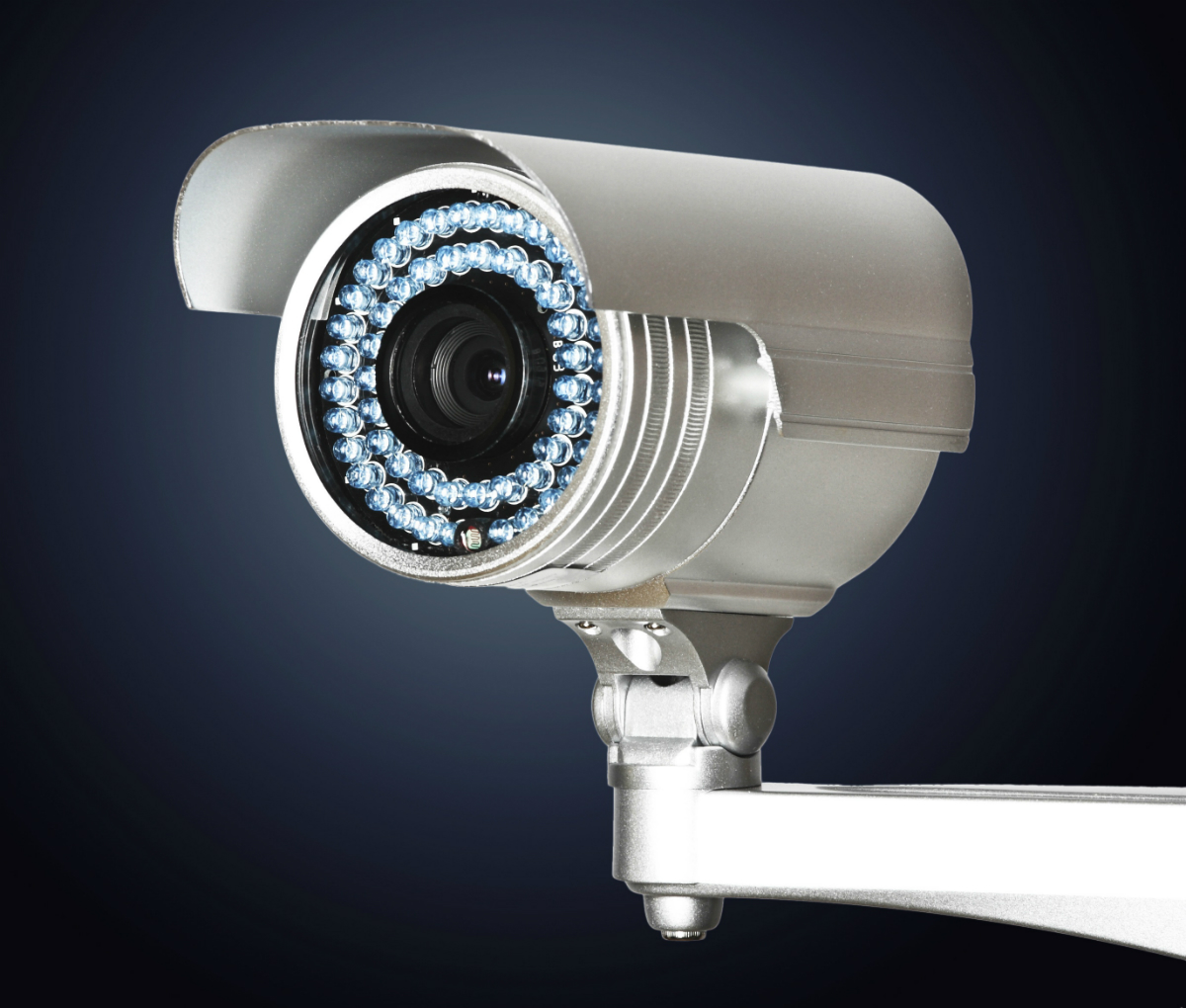 Video surveillance camera on a dark blue background